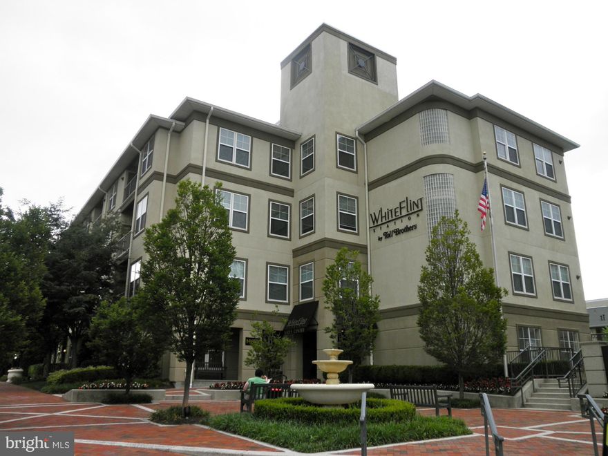 Meticulously maintained luxury condo just 1 block fm White Flint Metro. Open floor plan w/HW floors, upgraded baths, granite countertops & SS appliances. 2 walk in closets, balcony, gas stove, 1 covered parking space. Resort style amenities-24 hr fitness center, concierge, outdoor pool & clubhouse.  Walk to Pike & Rose. Minutes to Bethesda, DC, NIH & Walter Reed.  Convenient to Rt 355, 270 & 495.