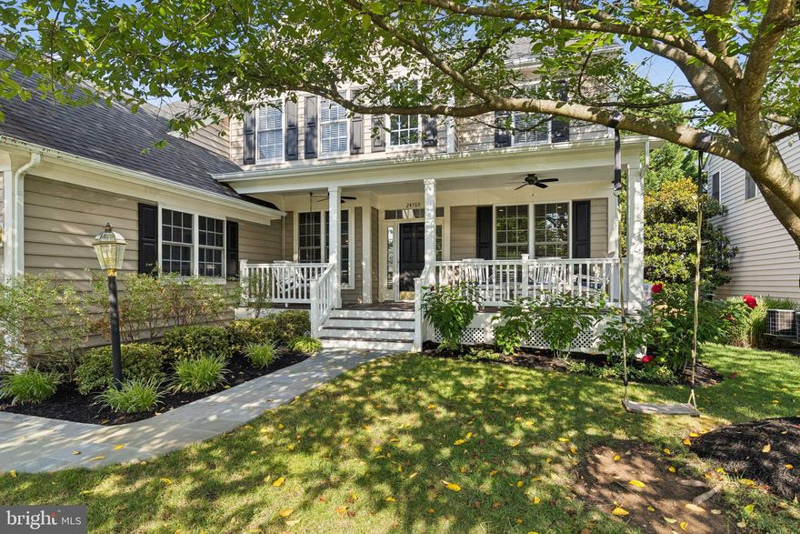 Welcome to Stone Ridge a sought-after amenity filled community -  offering pools, fitness center, tot lots, walking paths, Byrne's Ridge Park and more! When you arrive  to Stone Pillar Drive you are greeted by beautiful landscaping, updated flag stone sidewalk and a rare, East facing, front porch with ceiling fans added  by the owners in Spring 2022.  Inside you will find three finished levels with walk-up finished basement and an abundance of natural light. The main level offers you ample space to work, play and entertain. The main level hardwood floors were refinished & walls repainted in 2019. The large kitchen offers granite counters, island, gas cooktop, double wall oven and desk space. The kitchen pantry shelving upgraded to optimize storage in 2019.  Enjoy hosting in the living room, dining room with upgraded wainscoting (2019) and expansive two story family room with wall of windows and floor to ceiling stone gas fireplace.  Easy access to main level laundry and mud room just as you enter from the oversized two car garage. In Spring 2020 the double garage door was converted to one oversize door and raised it to 7.5 ft - perfect for storing a large SUV, boat or setting up a home gym. Garage has a mini split HVAC to keep cool!  On the upper level find four spacious bedrooms. The primary suite has 2 walk in closets, oversized linen closet and tray ceiling. Huge primary bathroom with new shower (2022) dual vanity, soaking tub and water closet. Walk-up lower level has a rec room, den, media room with bar and a new full bathroom added by the current owners in 2019. Enjoy the large deck and fenced in backyard. Shed attached to the home to store lawn mower. Other updates include new hot water heater (2022), custom window blinds throughout the home (2019), new patio door (2021), installed new basement carpet (2023), refreshed media room (2023) & freshly painted eaves 2025.  Roof replaced in 2017. Furnace humidifier, media room equipment and kitchen fridge ice maker as-is.  Nearby is Stone Springs Hospital Center, schools, grocery stores and dining. Short drive to Loudoun's wineries and breweries. Full list of updates available! Deep freezer and family room speakers do NOT convey.