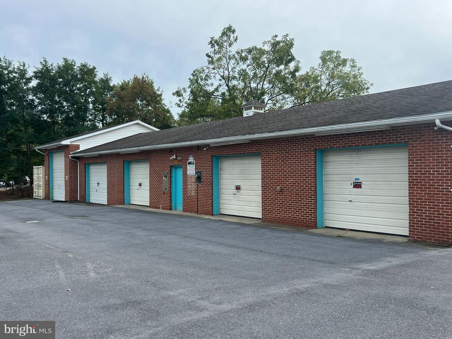 Want To Own Your Very Own Storage Facility. Here's your chance. 6 bays plus a storage container. Previously a car and truck wash but now converted to a Storage facility. The property is  all black top and ready to go. Could be converted back to a car wash if that's what you desire. Could possibly be converted to office space, either a group of offices or individual offices. Conveniently located on a highly traveled road and close to Smithsburg, Rt. 64 and only minutes from I-70. Call for a private tour and other details.