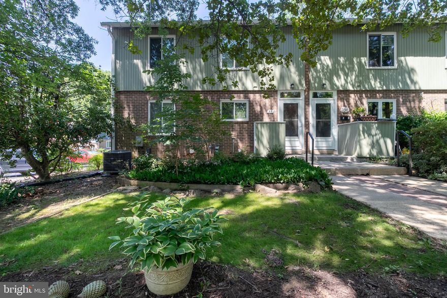 OFFER DEADLINE IS NOON, FRIDAY, JULY 4TH.  This incredible, 4 bedroom GHI home offers the best in cooperative living  while offering the modern amenities the older units lack. Built in 1970,  these 3 story units offer central AC and heat, natural gas cooking and a gas furnace for higher efficiency.   In addition, the breezeway wall has been  partially removed and  the space incorporated into the home creating a wide open feel! The hardwood floors have been refinished and are some of most stunning you will see in GHI.  A first floor half bath is tucked inside the entry.  An airy, open kitchen/dining room are filled with natural light.  Off the living room,  patio doors lead to a spacious screened porch and deck!  Upstairs, you will find 4 roomy bedrooms and a full bath.  The stunning hardwood floors continue throughout all bedrooms.  Attic stairs access additional storage space.
The lower level has a full, remodeled bath  and an unfinished space just begging for you to move in and make it your own. Theater room? Home office? recreation space? You name it! No more undoing what previous owners did.  It can be a challenge finding a home that offers you a chance to design that extra space as you see fit.  The whole house has been freshly painted and  the exterior has been power washed for a pristine look.  Location, parking, square footage,  condition,  this amazing home has it all! The coop fee includes major maintenance,  the property taxes,  and more!