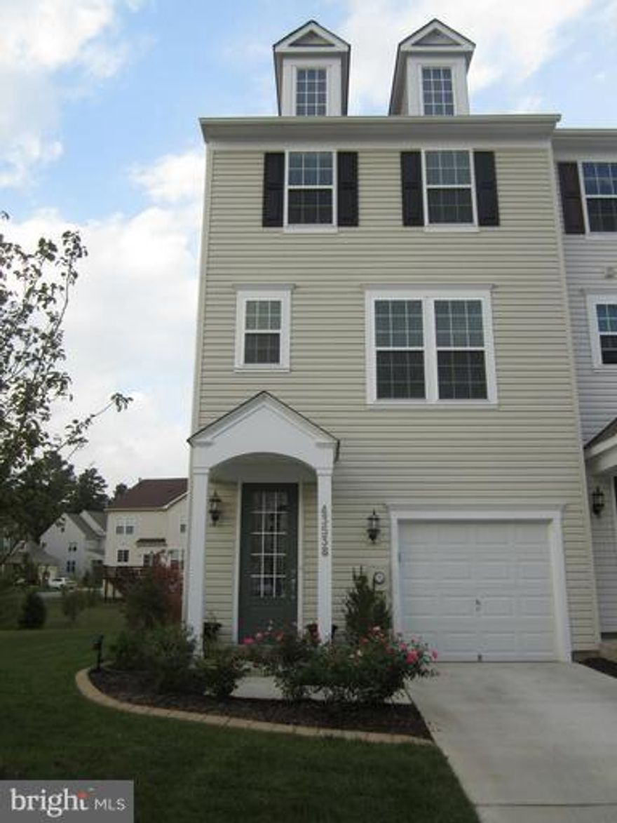 Beautiful end unit nearly new town house but even better because it has the deck completed and finishing touches.  3 Full bathrooms 3 bedrooms and the location is wonderful and centrally located.  Close to park, schools, and Navy Base.