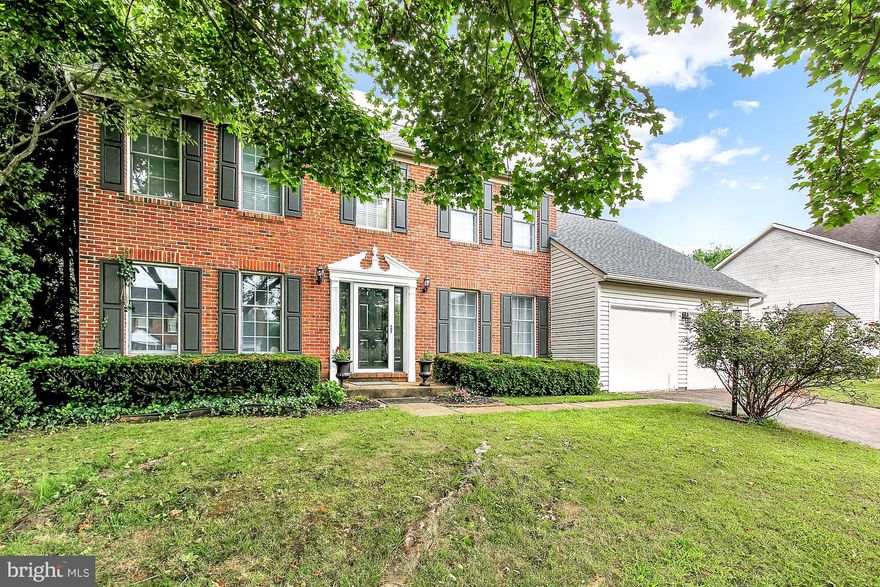 Lovely "Hampton Ridge" colonial ready for you to call home! This home offers a half acre, private yard that is fully fenced in the rear. Updates include newer front door and surround, gorgeous bamboo wide planked floors, paint, HVAC system replaced in 2012, new gutters.  Terrific sunroom, Ample square footage, storage and yard makes this house a winner!!