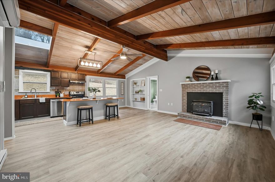 Discover this beautifully renovated ranch nestled in the desirable Keyes Ferry area, offering the freedom of NO HOA and private community river access  (with a simple road maintenance agreement). This stunning home boasts 3 generously sized bedrooms and 2 full baths, complemented by vaulted ceilings and a bright, open-concept kitchen and living space anchored by a cozy wood stove, perfect for relaxing evenings.
Completely transformed inside and out, this home shines with thoughtful updates and modern charm. The property also includes three versatile outbuildings, ideal for storage, workshops, or hobbies, along with a fenced garden area ready for your green thumb. A durable metal roof adds peace of mind, and the excellent commuter location offers easy access to Virginia and Maryland.
This one won’t last long. Schedule your showing today!