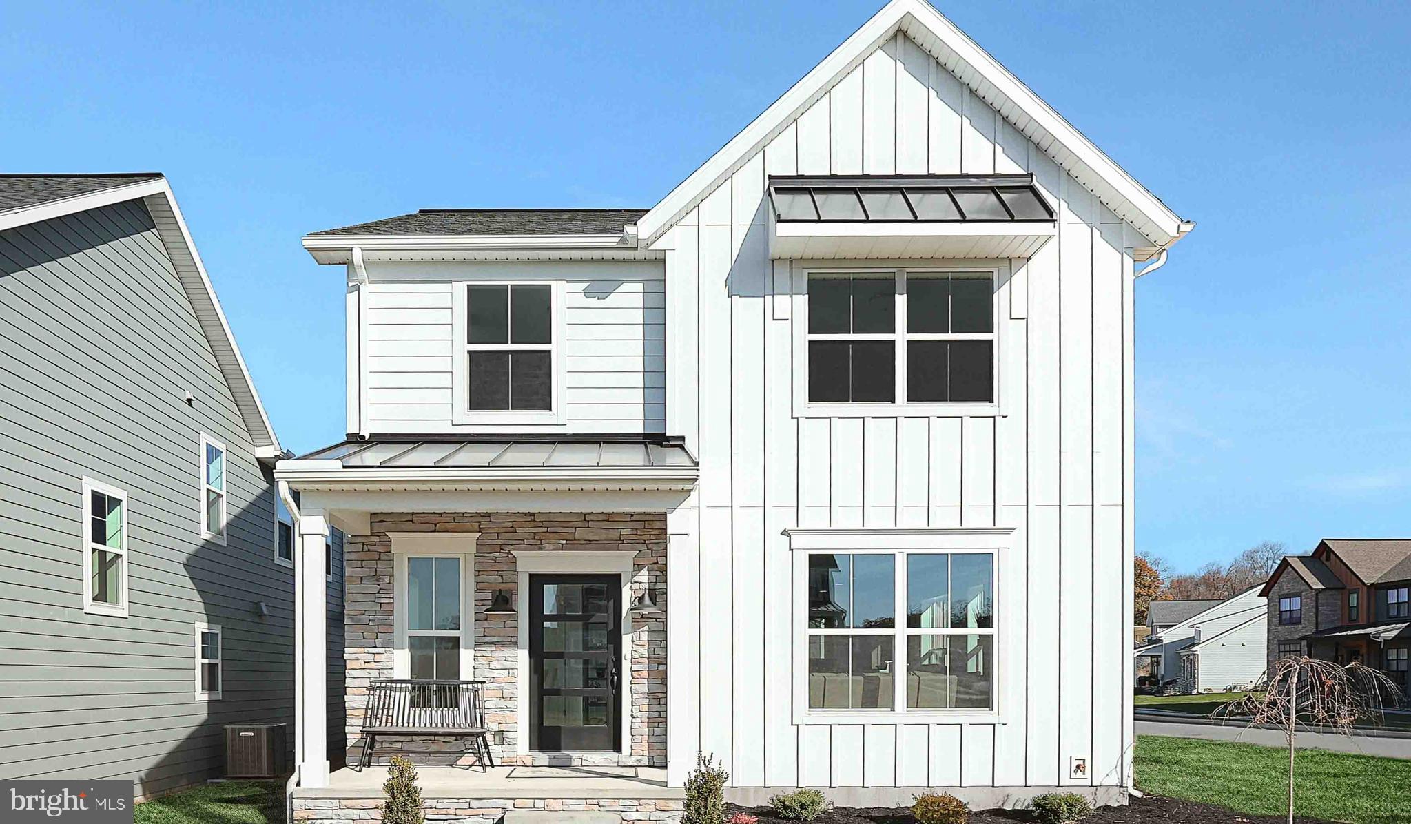 This 2-story home with a sleek profile includes a rear load garage with mudroom entry, and a screened in porch for outdoor living. The first floor boasts 9’ ceilings and vinyl plank flooring throughout the main living areas. The kitchen, featuring stainless steel appliances, attractive cabinetry, and quartz countertops with a tile backsplash, opens to the spacious dining area and sunny living room with a modern electric fireplace design and a box beam mantel. The 2nd floor boasts an owner’s suite with an expansive closet and private bathroom, 2 additional bedrooms, a second full bathroom, and a convenient laundry room. The community features 19 acres of green space, walkability to restaurants, community events, etc. and is convenient to Harrisburg, Hershey, and major highways.