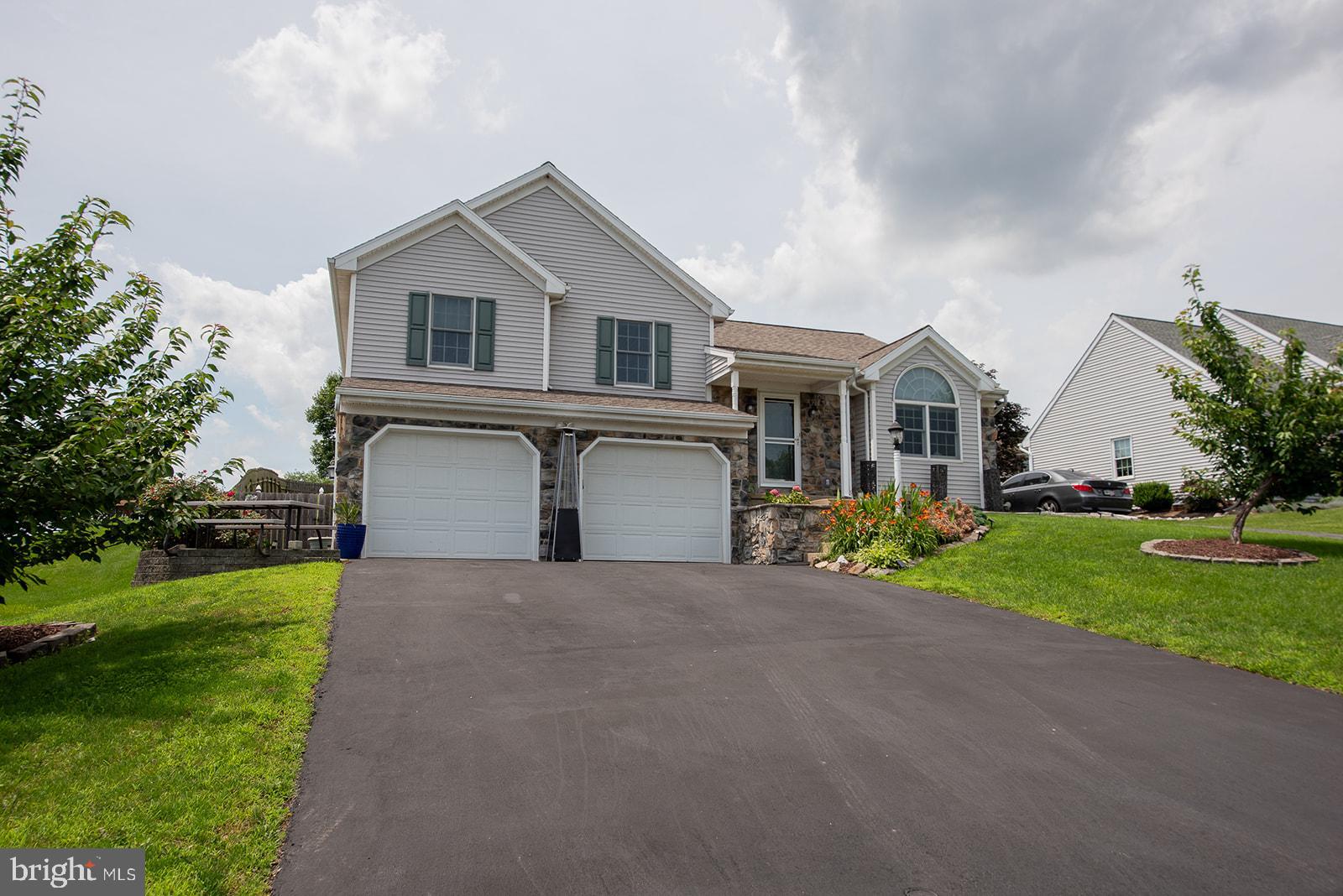 Welcome to 34 Shefford Dr — a beautifully maintained, 4 bedroom, 3 full bath, split-level home in the heart of Elizabethtown! This spacious property offers the perfect blend of comfort, versatility, and outdoor enjoyment. Featuring a private in-law suite in the lower level with its own living space, full bath, and laundry area, it's ideal for multi-generational living or guests.
Enjoy the convenience of two driveways, a 2-car garage and two laundry areas for ultimate functionality! The open-concept main living area is bright and welcoming with vaulted ceilings and a cozy stone fireplace. You'll love the large, fenced yard — perfect for summer gatherings, backyard fun, or winter sledding adventures down the gentle slope!
Relax on the multi-level patio and deck with covered gazebos, or savor quiet moments under the mature trees and landscaped yard. Recent updates include a newer roof and water heater, giving you peace of mind! This is more than just a house — it’s a place that feels like home in every season. Don’t miss your chance to own this gem in a peaceful neighborhood close to schools, shops, parks and just minutes from Route 283. Don't miss out! Schedule your showing today!