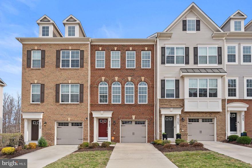 Welcome to 9507 Sycamore Grove, located in the sought-after Smith Home Farm community of Upper Marlboro. Spanning 1,976 square feet across three thoughtfully designed levels with numerous upgrades originally purchased by the seller, this home seamlessly blends style, comfort, and functionality. Upon entry, the welcoming hallway leads to a spacious family room that opens to the rear yard, creating a perfect space for relaxation or entertainment. A convenient powder room and two closets complete this level. Upstairs, the open-concept layout connects the gourmet kitchen, dining area, and living room, making it an ideal space for both everyday living and hosting guests. The living room extends effortlessly to a private balcony, perfect for enjoying fresh air, serene views, and the South-facing dining room enjoys attractive views from a wall of Palladian windows. The third level is dedicated to rest and retreat, featuring a luxurious primary suite with a large walk-in closet and a spa-like bathroom. Two additional bedrooms provide versatility for a home office or a personal gym. A full hall bathroom, a linen closet, and a laundry room ensure convenience for family and guests alike. Garage parking and additional driveway parking complete this special offering. 

Situated in a vibrant, amenity-filled community, where you will enjoy a fitness center, outdoor pool, movie screenings and more, playgrounds, walking trails and wooded surroundings, with easy access to shopping, dining, and major commuter routes, this home offers a perfect blend of modern convenience and close-in, suburban charm.