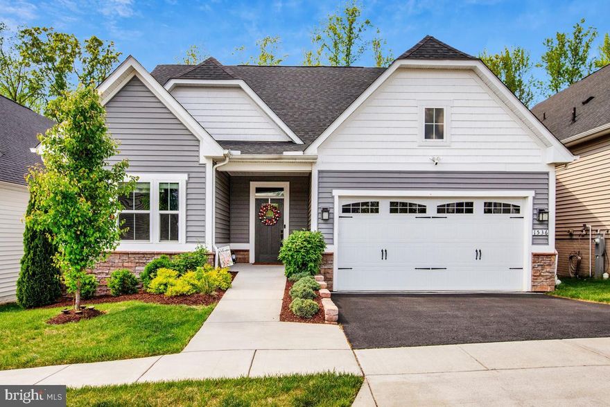 Part of 55+ section of Two Rivers in Odenton, like new this gorgeous home is designed for comfortable living with elegance.   The main level has a primary suite, an additional bedroom with 2 full bathrooms and a den.  The basement is practically  designed to sit back and enjoy a large family room with custom made cabinets and a spacious guest bedroom with another full bathroom.   The back porch is screened in to enjoy summer.
For your comfort, a lot of extra amenities....dual shower, bidet, luxury vinyl flooring, custom built in closets, custom blinds, whole house generator and wheelchair accessibility.