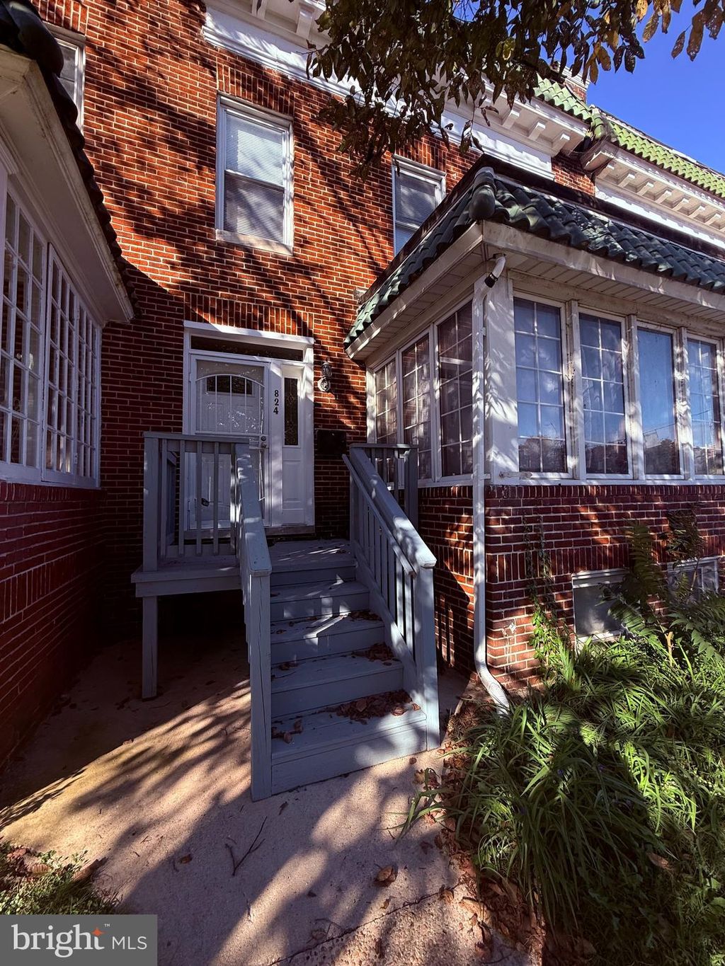 Photo of 824 E 33rd Street, BALTIMORE, MD 21218 (MLS # MDBA2187578)