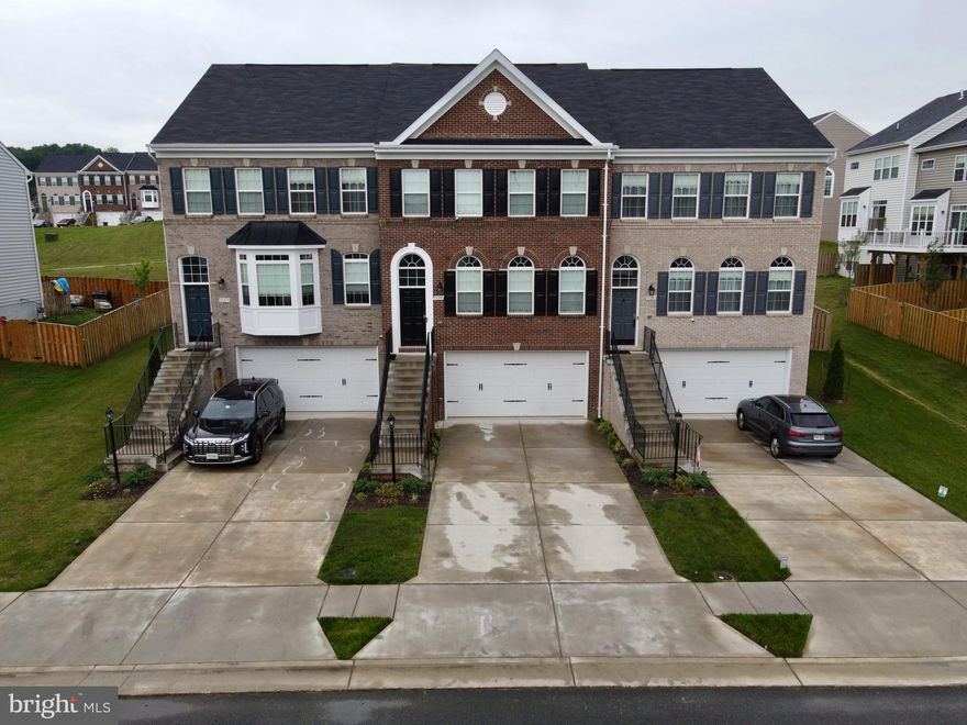 Motivated Seller! New Price + Seller will Pay Buyer's Closing Costs if Settlement is done through RL Title + $10,000 in Credit + Deep Clean Carpet & Home!

 Luxury Living at Its Finest! Step into this exquisite home where modern amenities seamlessly blend with timeless elegance. From the moment you cross the threshold, you’ll be captivated by the luxurious features and thoughtful upgrades throughout.

The main level boasts stunning hardwood floors that exude warmth and sophistication. As you ascend the staircases, elegant metal railings guide your way, creating a grand entrance that sets the tone for the entire home. Imagine cozy evenings by the electric fireplace, its flickering flames casting a warm glow across the room. Whether you’re entertaining guests or enjoying quiet family moments, the surround sound speakers in the kitchen, master bedroom, living room, and basement living room ensure an immersive audio experience. The heart of this home is the chef’s gourmet kitchen. With a double oven, stovetop, and industrial style exhaust fan, culinary delights await. Recessed lights illuminate the bedrooms and , and additional TV mount outlets keep you connected while you cook.

Step outside onto the deck, where you can sip your morning coffee or host al fresco gatherings. The main level and every bedroom & office feature recessed lights, creating a cozy and inviting atmosphere. Practical conveniences abound, including a 240-volt ready garage outlet for your electric vehicle or power tools. And when you need a breath of fresh air, this property backs to a serene playground & common grounds. All of this luxury comes with a low monthly HOA fee of just $79, which includes trash service. Additional parking is available without needing a pass.
Don’t miss the opportunity to make this exceptional property your own. Schedule a showing today!