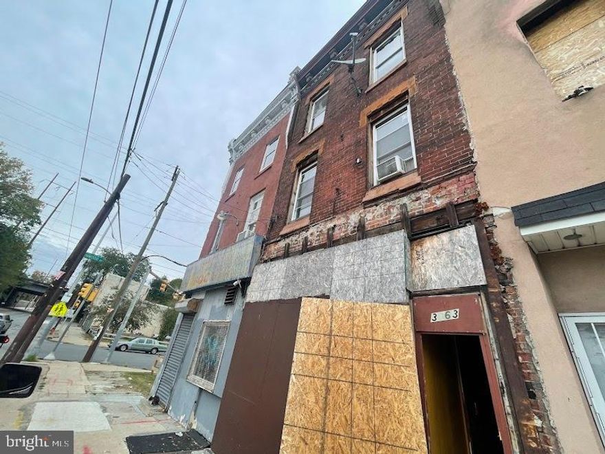 🔥 Investor Alert – CMX2 Zoned Mixed-Use Building with Huge Potential! 🔥
Attention investors and developers! This CMX2-zoned property offers endless possibilities. The vacant storefront on the first floor was previously used for storage, while the upper level features 5 bedrooms that were used as a rooming house. The building needs a complete rehab, making it the perfect opportunity to create income-producing units or a mixed-use gem in a rapidly developing area.

Sold strictly as-is. Seller will not clean out the property. Buyer is responsible for obtaining the U&O certificate, and paying both sides of transfer taxes and all closing costs.