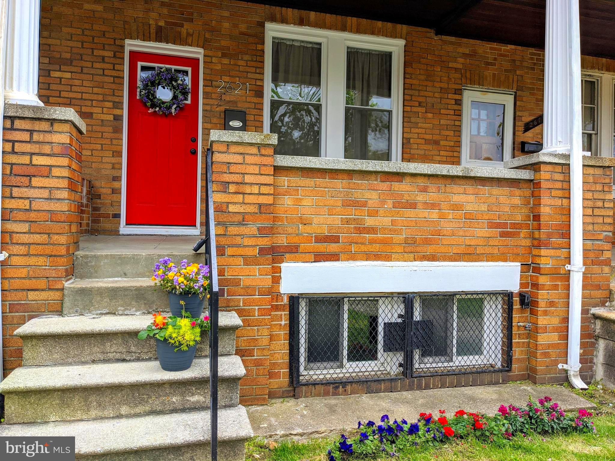 BRIGHT AND SUNNY WITH SPACE TO GARDEN! Come fall in love with this gem in East Baltimore! This 2BR, 2.5BA home features an open floor plan with original hardwood floors, an open kitchen with a double oven, stainless appliances and granite counters. The master bedroom has plenty of closet space and has a master bath with trending barn doors. The finished basement offers an extra room perfect for office space, a play room, or workout space. The rear walk out to the fenced in yard is perfect for entertaining friends and family this summer. The front lawn offers space to garden and the covered front porch has plenty of space to create a welcoming outdoor getaway. Close to Johns Hopkins, and favorite East Baltimore attractions such as 16 On The Park, Attwaters, Starbucks, and Eager Park!