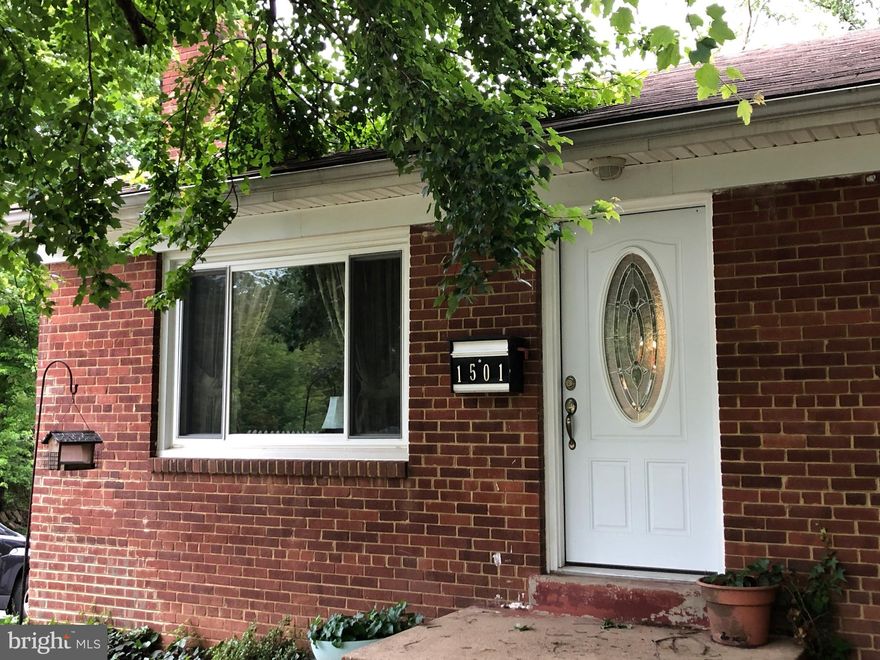 WOW - Check out the detached oversized 2 car garage/work shop - whatever you want to use it for.  Current owner uses it as a woodworking shop and storage for his lawn mower and other things.  This house comes with 5 bedrooms.  Have extended family, this is the place for you. Lower level comes with a huge family room that has 2 large separate bedrooms. Newly re-done full bath with a tub, and separate laundry room.  There is also a  "kitchenette" that stays with a fridge, sink and an electric stove.  Separate entrance Oil heat that gets inspected each year, and was replaced within the last several years. Ceiling fans in most rooms and A/C window units in each room upstairs. Main level has 3 bedrooms 1 full and 1 1/2 bath. Kitchen with granite counter tops, pantry and separate area with room for a table.