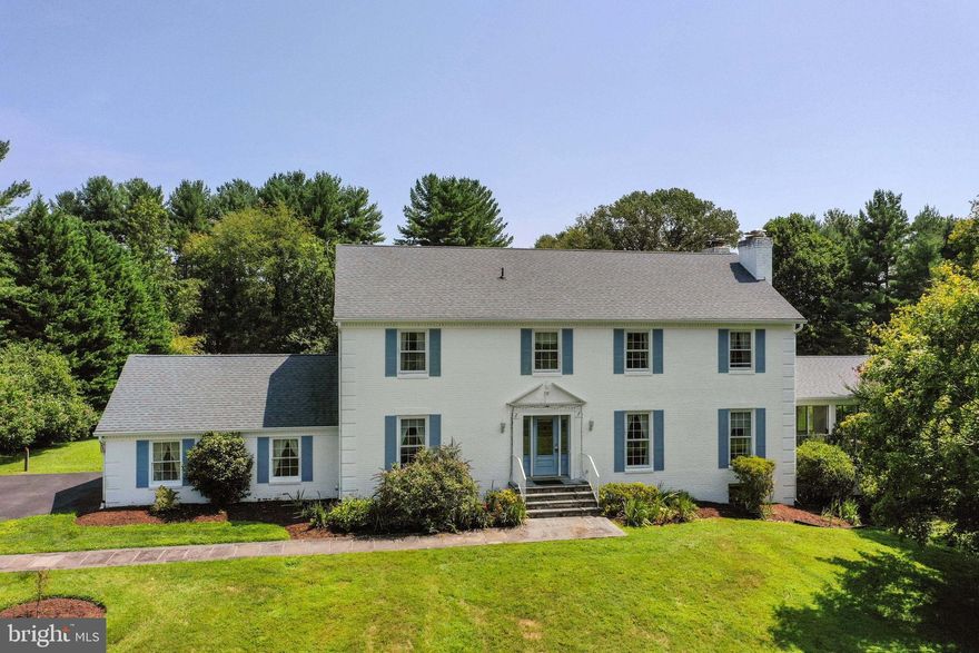 Inviting home with slate entrance foyer, hardwood floors throughout and formal living  and dining rooms.  Large 23x23 sun room addition with integral 3rd car garage below. )ver 2 acre lot with shed and fenced in area for your garden.  Basement contains in law suite with living room, kitchen bedroom and full bathroom. Family room with large picture windows and wood burning stove with heatilator for those cold winter nights.
