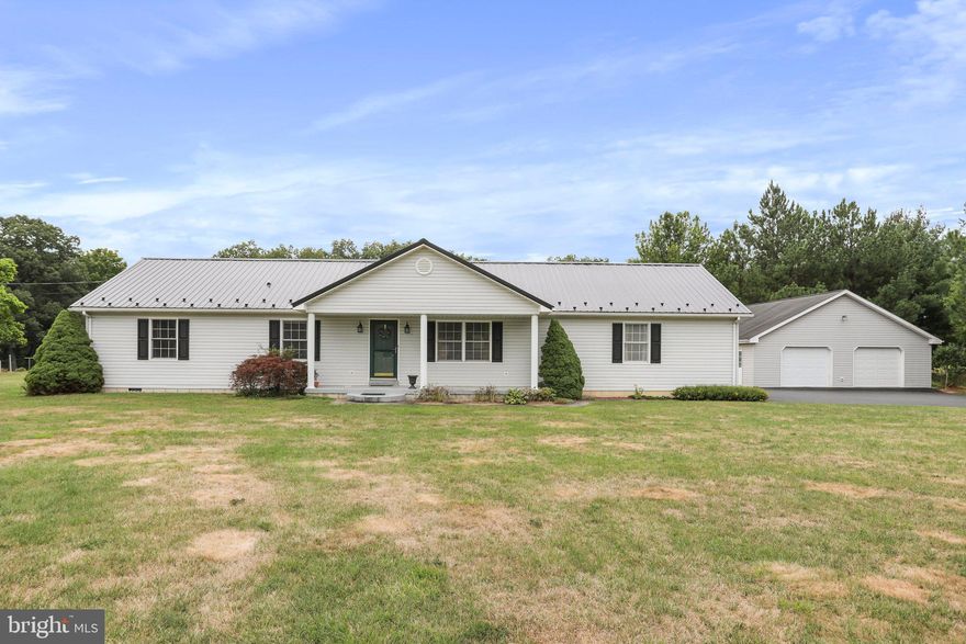 Introducing a charming four bedroom, two full bath ranch home in beautiful West Virginia countryside. 
nestled in the picturesque countryside of West Virginia, this rock-solid ranch home offers a serene retreat on a spacious one and a quarter-acre lot. Located just a stone's throw away from the charming town of Moorefield, you'll enjoy the perfect blend of rural tranquility and easy access to shopping, conveniences, and excellent commuter routes. This ranch-style home is designed for the utmost convenience with all living spaces on a single level. No stairs to climb, making it perfect for all generations. With four generously sized bedrooms, there's ample space for family, guests, or even a home office. Each room offers comfort and tranquility, with large windows welcoming in the natural beauty of the surroundings. Two beautifully appointed full bathrooms ensure that the morning rush is a breeze. Enjoy the convenience of having enough space for everyone. The home is built on a crawl space foundation, proving a solid and stable base while allowing for easy access for maintenance and repairs.  Cars enthusiasts and DIYers will love the massive detached three-car garage. It's not just for vehicle; it offers plenty of room for a workshop, storage, or even a potential studio space. The property boasts a nice level lot, making outdoor activities and landscaping projects a joy. Whether you're into gardening, outdoor gatherings, or simply enjoying the open space, this lot has it all.  The home is designed with easy maintenance in mind. From the metal roof that provides durability and longevity to the well-maintained exterior, you'll spend less time on upkeep and more time enjoying the West Virginia lifestyle. For those who need to commute to work or access nearby amenities, this location is ideal. Easy to major commuter routes means you can enjoy the rural charm of West Virginia without sacrificing convenience. This charming ranch home combines the best of country living with modern comforts and accessibility. Whether you're relaxing on the front porch, tending to your garden, or working on a project in the spacious garage, this property offers a peaceful and welcoming retreat in the heart of West Virginia's stunning countryside. Don't miss the opportunity to make this your forever home.