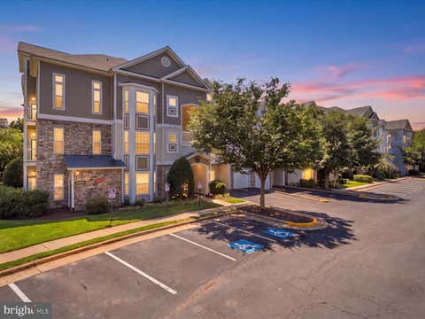 Photo of 504 Sunset View Terrace SE #301, LEESBURG, VA 20175 (MLS # VALO2132572)