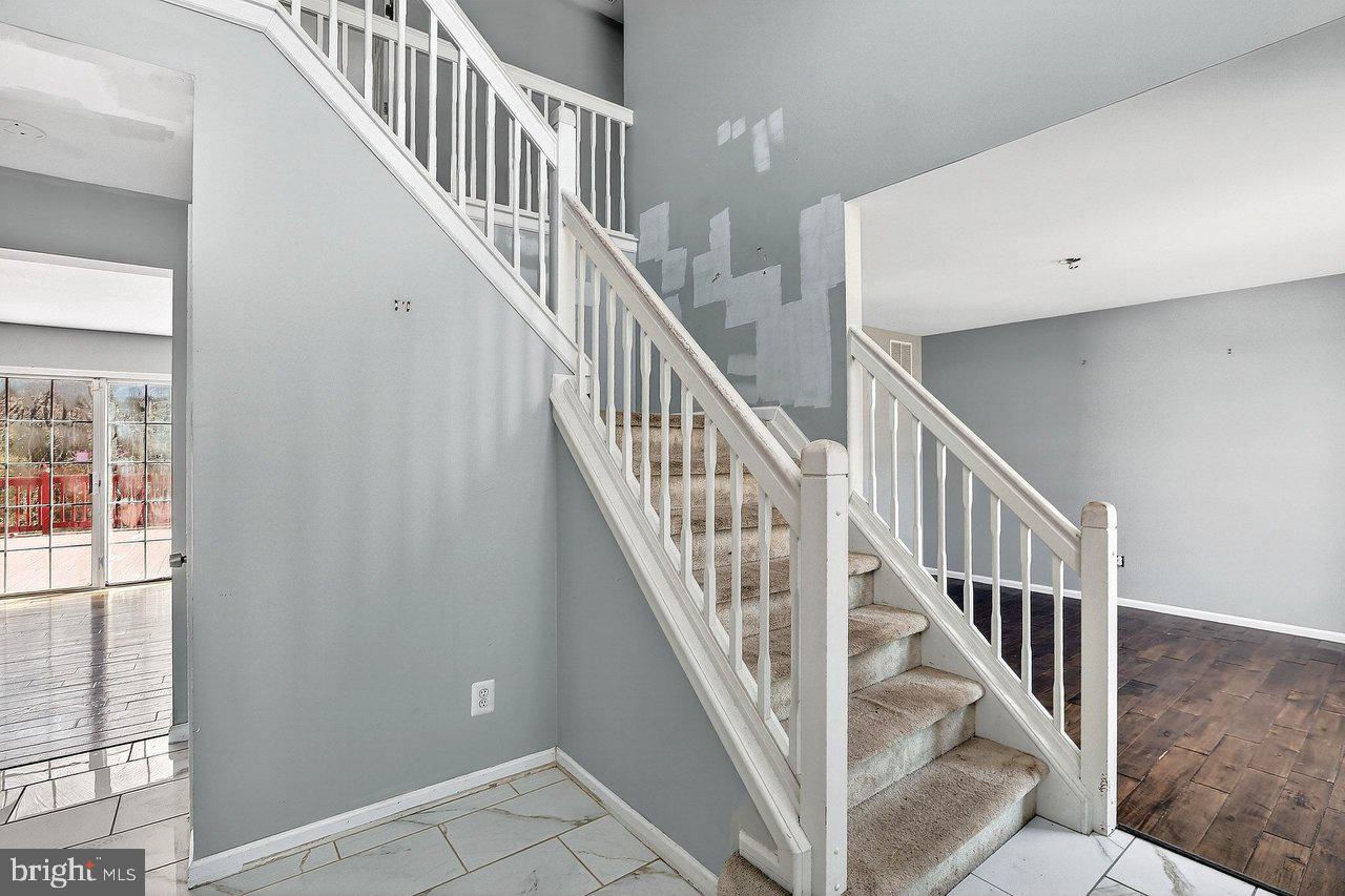 1244 WHISPERING WOODS DRIVE