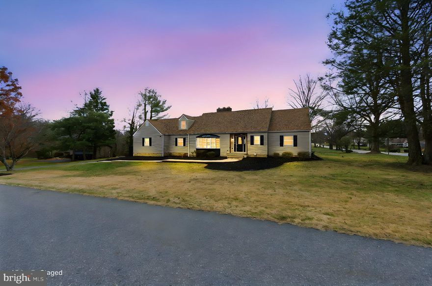 Welcome to 1 Lamatan Rd, this stunning Cape Cod style home offers timeless charm and modern comfort, sitting on .78 acres in the quiet community of Lamatan. Featuring 4 spacious bedrooms and 3.5 bathrooms this home provides an ideal layout for both everyday living and entertaining. Entering the property, you will be greeted with Brazilian cherry floors throughout the first floor, sunken living room with vaulted rustic barn wood ceiling, wood burning fireplace, and tons of natural light. Off the living room is a dining room perfect for special occasions. The kitchen is equipped with SS appliances, plenty of cabinet space, granite countertops, new double oven and natural gas cooking. The open concept kitchen expands into the sitting area/family room with wood burning fireplace and access to the 12x 48 trex deck with hot tub. The first floor primary bedroom has a walk-in closet and ensuite that has been beautifully updated with massive custom walking-in shower, soaking tub, double vanity and heated tile flooring. The first floor also has an additional bedroom, half bath and mudroom/laundry area. The second floor has 2 generously sized bedrooms with ample closet space, new carpet, and a full bath. Off the side of the mudroom on the main level is a 20x19 utility room perfect for storage or a workshop area. Above the 3-car garage is a 1200sqft additional living area w/ vaulted ceiling, new paint, carpet, full bathroom, laundry, kitchenette, and private trex deck off of the back. This area is perfect for a game room, home gym or additional great room. Access to this areas is through the garage or through an exterior door to the left of the garage. The unfinished basement is a full footprint and has tons of potential to be finished or a great storage area. Located close to restaurants, shopping, parks, Route 1 & I-95. The property has been well maintained over the years and is awaiting its new owner. Make your appointment today!! Updates include: roof 2023, A/C 2023/2024, Septic 2025, carpet 2025, paint 2025, double oven 2025, trex deck 2023/2025, hot tub 2023 & more! The property is being sold in "AS-IS" condition.