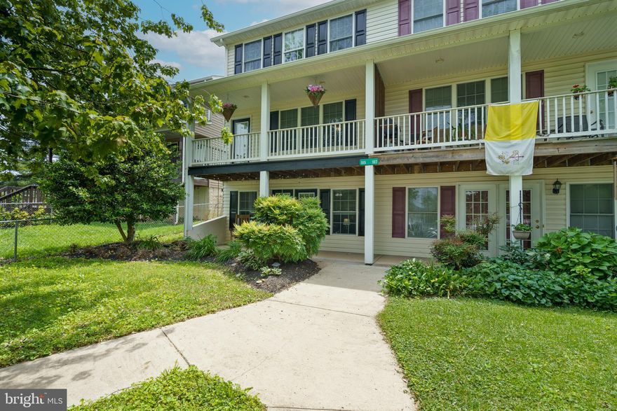 This beautifully maintained 2-bedroom, 3.5-bath townhome offers over 2,100 sq. ft. of thoughtfully designed living space and includes a 1-car garage. The main level features a bright, open layout with a large living room centered around an electric fireplace, and a modern kitchen with stainless steel appliances and a generous walk-in pantry. Upstairs, you'll find two spacious primary bedrooms, each with its own ensuite bathroom for ultimate comfort and privacy. The fully finished lower level includes a full bath with a standing shower, a laundry area, and a large family room—ideal as a recreation space or potential third bedroom. Enjoy the inviting multi-level front porch and flexible floor plan that fits a variety of lifestyles. A wonderful place to call home!  Located within walking distance to Evitts Run Park and Historic Downtown Charles Town and within minutes of Hollywood Casino and Races along with dining and shopping. Great for commuting to the DMV area. Schedule a private tour today!