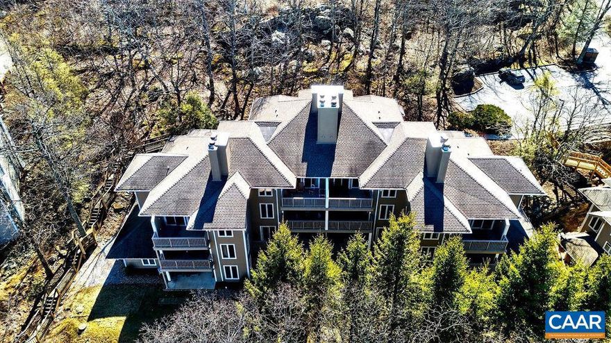 Just Wow! Coveted top floor end, 2 bedroom, 2 bath. This home has convenient ingress/egress with no steps from the parking area to the building and only 1/2 flight of stairs to the front door! Location rules as you are just steps away from the Devils Knob Country Club, Wintergarden Spa and Fire and Frost restaurant. Resort Amenities, Food and Drink and cool spring/summer breezes await.  Relax on the Deck overlooking the Golf, Tennis and Pickleball Club with a sneak peek across the Shenandoah Valley to the Virginia Highlands. New flooring and paint throughout complement one of the newer condo buildings. Furnish to your tastes and prepare to experience the lifestyle that Wintergreen and Nelson County have to offer. Act now! Make this your home before someone else makes it theirs. Stone Ridge condo dues are $1,575 per quarter and WPOA is $2,279 annually for 2026.,Formica Counter,Wood Cabinets,Fireplace in Family Room