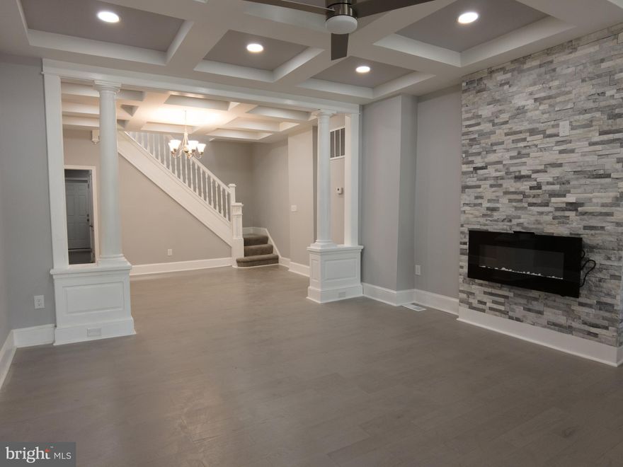 Welcome to 3115 Belair Road! This beautifully updated home has a warm, inviting feel with plenty of space and character throughout.

The main level features high ceilings, soft grey tones, and nice touches like coffered ceilings and decorative columns. The family room has a cozy tile fireplace and flows into a spacious dining area—great for everyday living or entertaining.

The kitchen is bright and modern, with quartz countertops, stainless steel appliances, a tile backsplash, and a breakfast bar. Just off the kitchen, there’s access to a fenced backyard and alley behind the house for added convenience.

Upstairs, the primary bedroom has a bay window with peaceful views of Clifton Park Golf Course, plus coffered ceilings and a private ensuite bath with beautiful tile work. There are two more bedrooms, one with a tray ceiling, the other with a sky light, and a hall bath that’s just as stylish as the primary.

The basement is unfinished but super clean, with plenty of storage and walk-out access to the backyard.

And don’t miss the covered front porch—perfect for enjoying your morning coffee while looking out at the golf course.

This home is move-in ready with a great blend of charm and modern updates. Come see it for yourself!