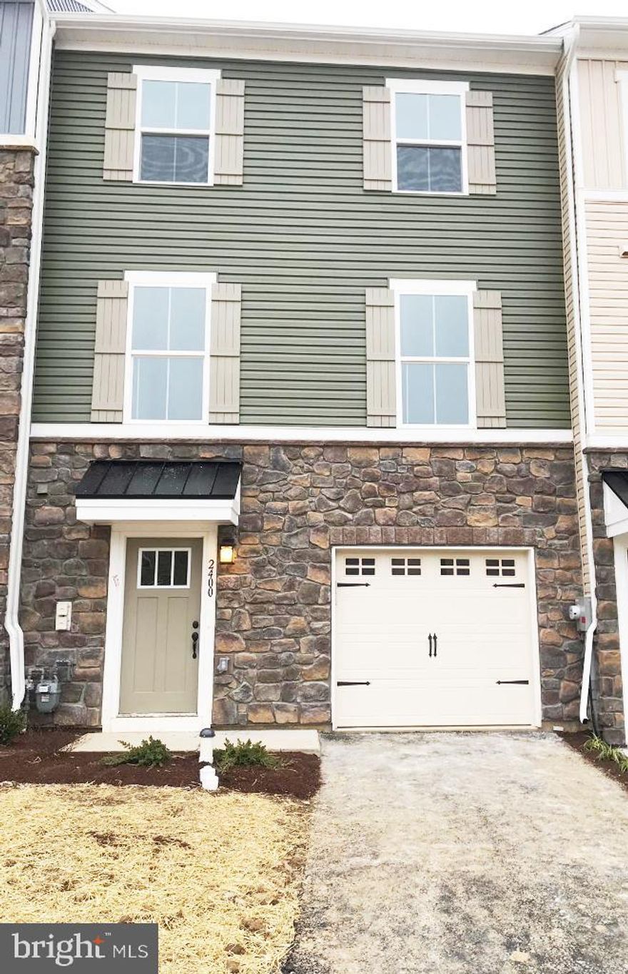 Just 5yrs old construction, 3-story townhouse featuring 3 beds, 2 full bath, 1 half baths in desirable Madison Farms Development. This home offers every imaginable upgrade with lots of living space and an abundance of natural light. Main level has wide plank hardwood floors in kitchen and dining area. Upgraded kitchen with 42" cabinets equipped with large island & recessed lights that opens up to a bright and airy Living room and stainless-steel appliances. Upstairs is Master bedroom with large bath and huge walk-in closets. Two extra spacious bedrooms with ample closet space, full hallway bathroom and a coveted second floor laundry completes second level. Lower level has full finished walkout recreation room with recessed lighting, Powder room with hardwood floor and 200 sq. ft. deck. Conveniently located near shopping, restaurants and minutes to Routes 33, 22 and 78 for easy commute to NY/NJ area.