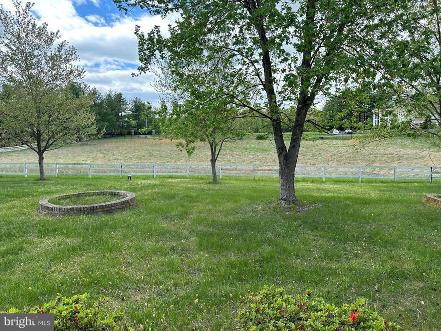 RENOVATE OR BUILD NEW! Overlooking the North Fork of Bull Run Creek, this lovely non HOA property is ideally sited on a GORGEOUS 4.79 PASTORAL LOT in Loudoun County's beautiful HORSE COUNTRY with open pastoral views and backing to mature trees! The property features a brick rambler on two finished levels with over 2146 square feet of living space. The main level features a large living/dining room, a family room with fireplace off the kitchen and a large rear sunroom. There are three bedrooms and two full baths on the main floor as well as a mudroom with half bath off the two-car side load garage. The walkout lower level offers a large recreation room with plenty of living space and a full bath. The property additionally features a SEPARATE GUEST HOUSE with so much potential! The guest house features a living room, kitchen as well as a bedroom and full bath. It's ideal as a second residence and/or as rental investment property. BRING YOUR HORSES OR CHICKENS! This property features a large fenced-in field, a 4-stall barn, and a shed and is ready to WELCOME YOUR ANIMALS. This is an estate sale and the property is in need of renovations. Sold in as is condition. The LOCATION IS SUPERB! Ideally located off Route 15 South and close to all major commuter roads including Route 50 and 66 as well as Leesburg and the Chantilly / South Riding area.