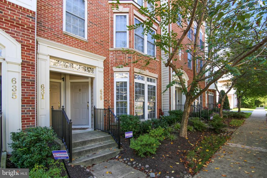 This is a beautiful light-filled two-level townhouse condo with a one car garage,  located in the Hidden Creek neighborhood of Gaithersburg.  The main level has an open concept with a gourmet kitchen with granite counter tops, breakfast bar island and gas stove.   The main level has beautiful hardwood floors and a large bay window that provides lots of natural light.  This townhouse also offers many upgrades including triple crown molding, recessed lighting, ceiling fan and a multi room audio system and has been freshly painted throughout.  The top level has brand new carpet and features three bedrooms and two full baths.  The primary bedroom has two large walk-in closets along with a spacious bathroom which includes a dual vanity and a roman shower.  The second bedroom on the second floor offers a balcony view.  This home is ideally situated in the neighborhood near the clubhouse house, outdoor pool and tot-lot.