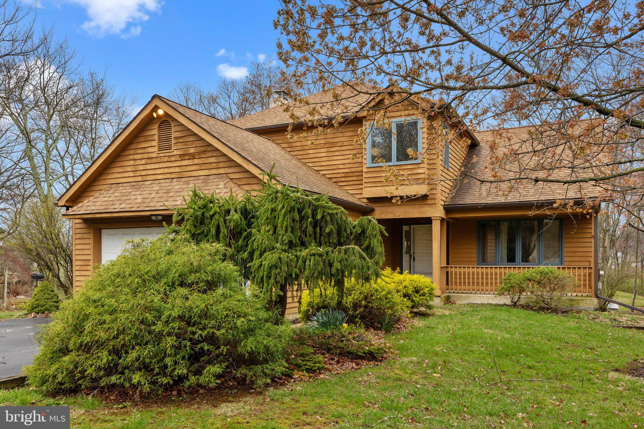 Welcome to 104 Park Road, a 4 bedroom, 2.5 bathroom Colonial in Horsham Township’s desirable Hatboro-Horsham School District! Situated on a generous .87-acre lot with a partially wooded backyard, this home offers privacy and natural beauty. Inside, enjoy a spacious layout featuring a cozy brick fireplace, a bright eat-in kitchen with ample cabinetry and sliding doors to a deck—perfect for outdoor gatherings. The walk-out basement provides versatile space for recreation or storage, and the two-car attached garage adds convenience. The inviting foyer with a classic wooden staircase sets the tone for this charming home, while vaulted ceilings and exposed beams in the living area create an airy, open feel. Large windows throughout flood the space with natural light, highlighting the potential for your personal touch in every room. Ready for your vision, this property is a rare find in a prime Horsham location!