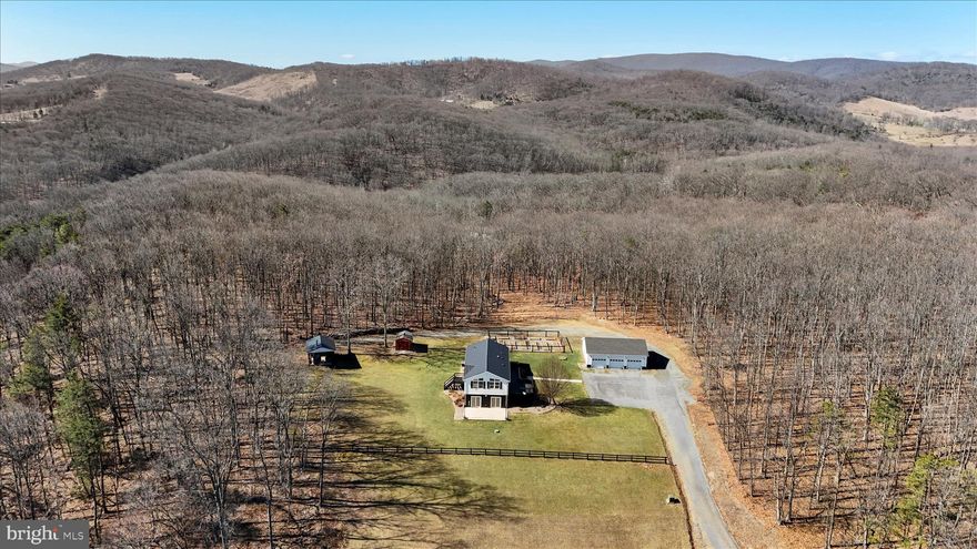 Welcome to your once-in-a-lifetime dream property in beautiful Augusta!

Perched on over 19 breathtaking, unrestricted acres, this exceptional property offers more than 2,700 finished square feet and truly heavenly panoramic views that stretch for miles. From the moment you arrive at the private electric gate, you’ll feel the peace, privacy, and freedom that only a property like this can provide—no HOA, no restrictions, just wide-open country living at its finest.

Inside, the home shines with natural sunlight and abundance of thoughtful upgrades throughout. The beautifully remodeled kitchen is the heart of the home, complemented by new flooring, a new HVAC system, and a durable standing-seam metal roof that blends style with long-term peace of mind. The oversized finished basement offers additional newly finished living space, perfect for entertaining, relaxing, or accommodating guests.

Step outside and experience the true magic of the property. A large main-level deck and walkout basement patio provide incredible spaces to unwind while overlooking the fenced pasture, walk-in shed, hunting stand and the property’s stunning stocked pond with fishing dock—one of the most captivating highlights of the estate. Whether you enjoy fishing, watching wildlife, or simply soaking in the scenery, this outdoor setting is unforgettable.

For hobbyists, car enthusiasts, or anyone needing serious workspace, the property delivers in a big way. In addition to the home, you’ll find a 3-car detached garage with finished interior and automatic doors, plus a massive 40x60 workshop/pole building with a commercial grade automatic door complete with its own 220-amp electric panel—ideal for projects, equipment, or a home business.

The home is also equipped with an upgraded electrical panel and a whole-home generator hook-up, ensuring comfort and reliability year-round. Another major feature of the home is the exterior wood furnace for heating during the cold months or to supplement during extra cold weather that offers heating efficiency and low electricity costs. 

Privacy, views, water, acreage, upgrades, and incredible outbuildings—this property truly has it all. Opportunities like this rarely come along.

Schedule your showing today and experience the beauty, freedom, and lifestyle this extraordinary Augusta property has to offer!

MORE PHOTOGRAPHS COMING SOON!