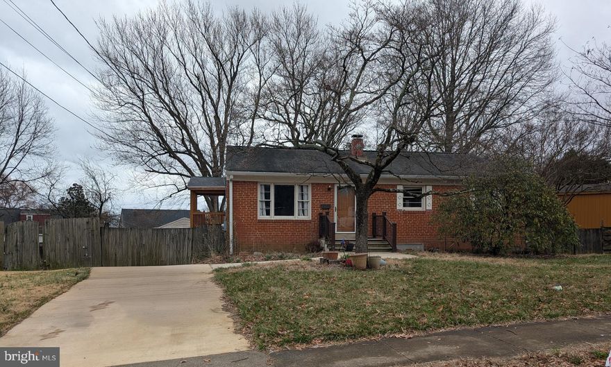 This 3 bedroom, 2 bathroom home on a .30 acre lot with a large basement needs substantial renovation but offers great opportunity for the right buyer. Both bathrooms are already updated, and all three bedrooms are generously sized. The entire home has great natural light. The primary bedroom has an ensuite bathroom. The huge backyard is fully fenced and there is plenty of parking space in the driveway or on the street. There is no HOA. There is a large, unfinished basement that walks out to the backyard, and could provide great additional living space to the home after renovation. The home also features a great layout that could be left as is or modernized with a few changes. Most of the floors throughout are hardwood. The home comes with the shed seen in the backyard, and the washer and dryer in the basement. Home is sold As Is. The home has no AC system of any kind. This is best suited for investors or buyers prepared for a major rehab project. Cash or conventional financing only.