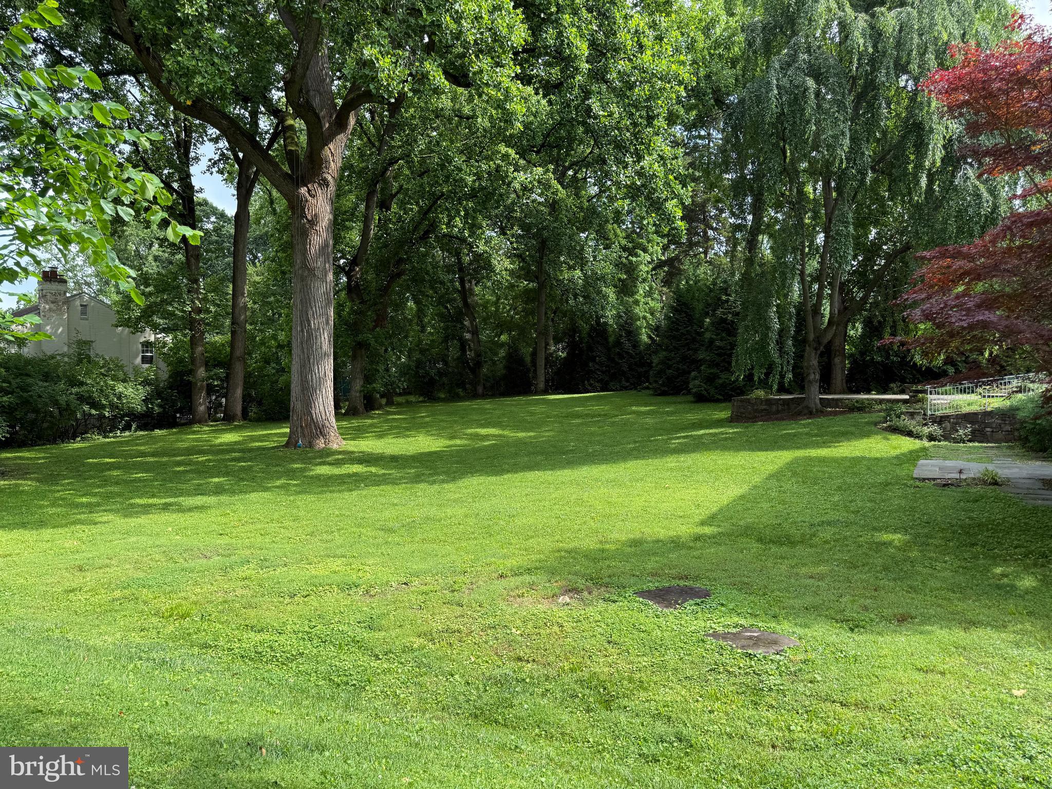 Don’t miss this rare opportunity to build your dream home on a 13,193 square foot vacant lot in the highly sought-after North Chevy Chase neighborhood. This level plot provides an ideal canvas for new construction. Nestled in a quiet area and surrounded by mature trees. This location offers a peaceful retreat while still providing outstanding access to the entire Metro area. It’s just 10 minutes to downtown Bethesda and mere minutes to I-495, making it a convenient spot for commuters.
Nearby, Chevy Chase Lake features specialty shops, retail stores, and restaurants, while Rock Creek Park offers excellent biking and hiking trails. The neighborhood also boasts a local pool, tennis courts, and several golf clubs for leisure and recreation.
