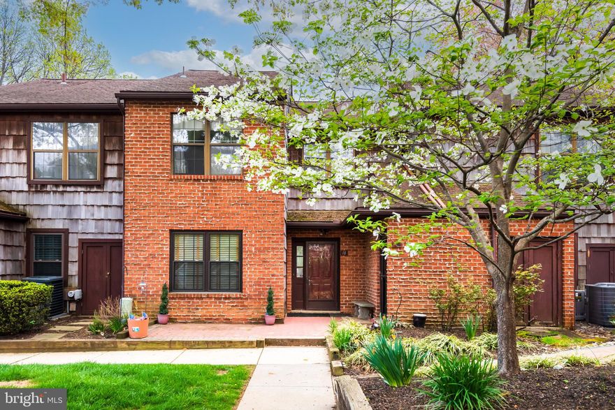 Welcome to 18 Witherspoon Court, a bright and spacious first-floor, two-bedroom condominium with a den offering pleasant views out the back in the highly sought-after Embassy Court community of Chesterbrook. This is a terrific opportunity to own your own home in the top-ranked Tredyffrin–Easttown School District. And the best part... NO STEPS! The tiled entrance foyer opens to a sun-filled living room and dining area, each with its own set of sliding glass doors to the rear patio. The living room also features a wood-burning fireplace with Colonial mantle. The eat-in kitchen is nicely finished with upgraded raised-panel cabinetry, plenty of gleaming granite countertops and stainless steel appliances. The spacious owner’s suite offers a walk-in closet with custom-built shelving and an en suite bathroom with a tiled shower and updated vanity. A perfectly situated dressing area with its own vanity and sits outside the walk-in closet. The second spacious second bedroom features 2 good sized closets and is served by a full hall bathroom, which also features an updated vanity. A tremendous bonus feature of this home is the den, a flexible space ideal for a home office, media room, or guest bedroom. A full-size laundry/utility room rounds out the home’s interior. The rear patio overlooks a pleasant open area and is the ideal setting for relaxing, grilling, and dining outdoors. Outdoor closets in the front and rear of the home offer great extra storage. Ideally located close to the Chesterbrook and Gateway Shopping Centers, the King of Prussia Town Center, Wilson Farm Park, and Valley Forge National Historical Park, as well as the shopping, dining, and train stations of the Main Line—all within the highly ranked Tredyffrin–Easttown School District. This is a great opportunity to own a nice home with an open floor plan in a prime Chesterbrook location. Make your move. Welcome home!