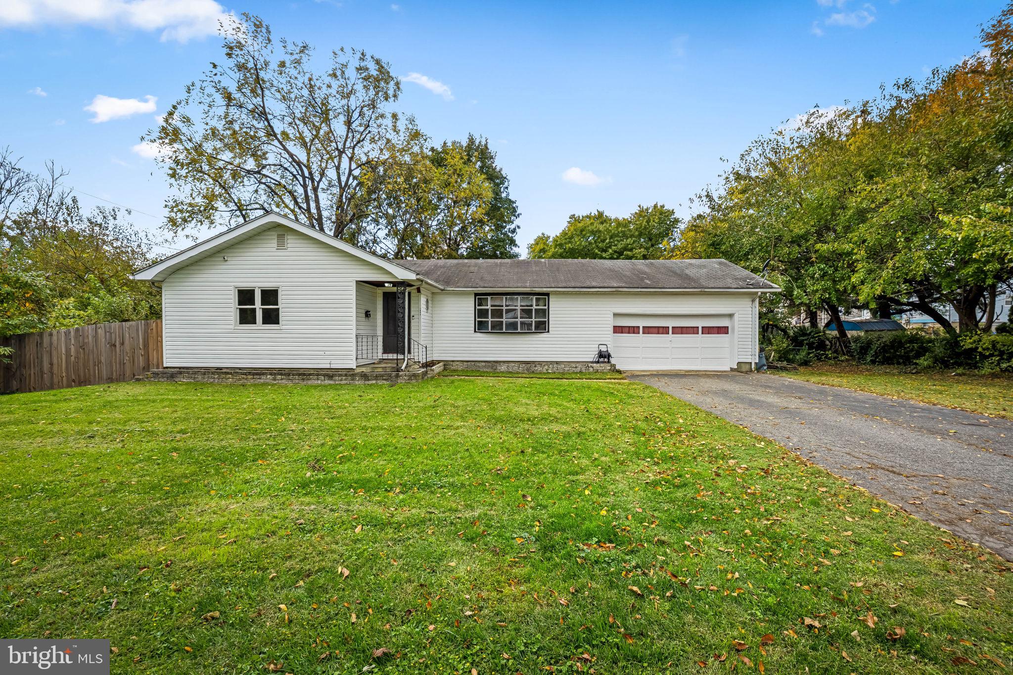 Welcome to 1804 Crafton Avenue, a spacious five-bedroom, two-bath rancher perfectly situated on a quiet dead-end street in Dundalk. This charming home offers a great blend of comfort, functionality, and thoughtful updates throughout.
The main level features a bright and inviting living room with a large picture window that fills the space with natural light. The kitchen is a true highlight, designed for both everyday cooking and entertaining, with white shaker cabinets, stainless steel appliances, updated countertops, and plenty of storage. A cozy breakfast nook and eat-in table space make it the perfect gathering spot. Three well-sized bedrooms with ceiling fans and soft carpeting complete this level.
The lower level offers even more living space with one additional bedroom, a bonus room that could be used as a fifth bedroom, a full bathroom added in 2021, and a large recreation room that’s ideal for a home theater, gym, or play area. There’s also ample room for storage or hobbies.
Outside, the property includes a two-car attached garage and a large, level yard—perfect for outdoor gatherings, gardening, or simply relaxing. As the last home on a dead-end street, it provides added peace and privacy.
Recent upgrades include a full kitchen renovation in 2019 with new cabinets, countertops, stainless steel appliances, and a custom breakfast nook; a new 50-gallon water heater and basement bathroom in 2021; and new laminate flooring and fresh paint in multiple rooms in early 2025. The exterior railings and garage door were also recently repainted, giving the home great curb appeal.
Minutes from local parks, schools, shopping, and commuter routes, this home combines modern updates with a quiet neighborhood feel—an excellent opportunity in the heart of Dundalk. Schedule your showing today! This one won't last long!