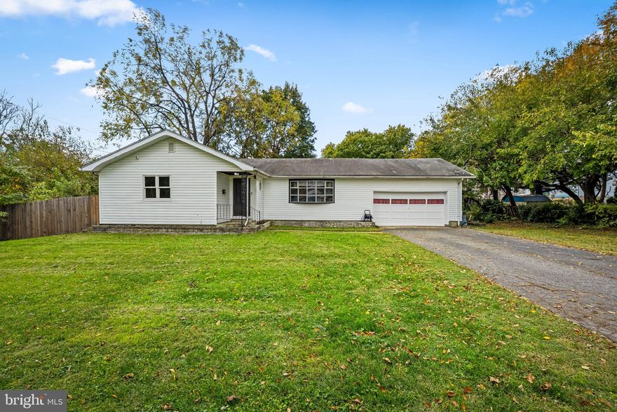 Welcome to 1804 Crafton Avenue, a spacious five-bedroom, two-bath rancher perfectly situated on a quiet dead-end street in Dundalk. This charming home offers a great blend of comfort, functionality, and thoughtful updates throughout.
The main level features a bright and inviting living room with a large picture window that fills the space with natural light. The kitchen is a true highlight, designed for both everyday cooking and entertaining, with white shaker cabinets, stainless steel appliances, updated countertops, and plenty of storage. A cozy breakfast nook and eat-in table space make it the perfect gathering spot. Three well-sized bedrooms with ceiling fans and soft carpeting complete this level.
The lower level offers even more living space with one additional bedroom, a bonus room that could be used as a fifth bedroom, a full bathroom added in 2021, and a large recreation room that’s ideal for a home theater, gym, or play area. There’s also ample room for storage or hobbies.
Outside, the property includes a two-car attached garage and a large, level yard—perfect for outdoor gatherings, gardening, or simply relaxing. As the last home on a dead-end street, it provides added peace and privacy.
Recent upgrades include a full kitchen renovation in 2019 with new cabinets, countertops, stainless steel appliances, and a custom breakfast nook; a new 50-gallon water heater and basement bathroom in 2021; and new laminate flooring and fresh paint in multiple rooms in early 2025. The exterior railings and garage door were also recently repainted, giving the home great curb appeal.
Minutes from local parks, schools, shopping, and commuter routes, this home combines modern updates with a quiet neighborhood feel—an excellent opportunity in the heart of Dundalk. Schedule your showing today! This one won't last long!