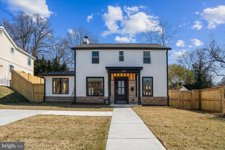Welcome home to this beautifully expanded 4-bedroom, 2.5-bath colonial, perfectly blending classic charm with modern convenience. Nestled in a desirable Silver Spring neighborhood, this home boasts spacious living areas, an inviting layout, and a stunning addition that enhances both comfort and functionality. 
Step inside to discover a bright and airy living room, complemented by gleaming hardwood floors.   The formal dining room is perfect for gatherings, while the new kitchen features stainless steel appliances, quartz  countertops, and ample cabinetry—ideal for any home chef.

Enjoy the convenience of completely rebuilt house with new appliances, new windows, all new plumbing lines , new 2 HVAC systems with all new duct work, and a new water heater. The home also boasts a new roof and  all new electric lines  with a heavy-up for added peace of mind.   The fully finished basement is completely new! All new stylish bathrooms with double sinks! 

Enjoy outdoor living in the private backyard, complete with a new deck, perfect for entertaining or relaxing. 
Every detail has been replaced it is all  NEW! NEW! NEW!  move in and enjoy!