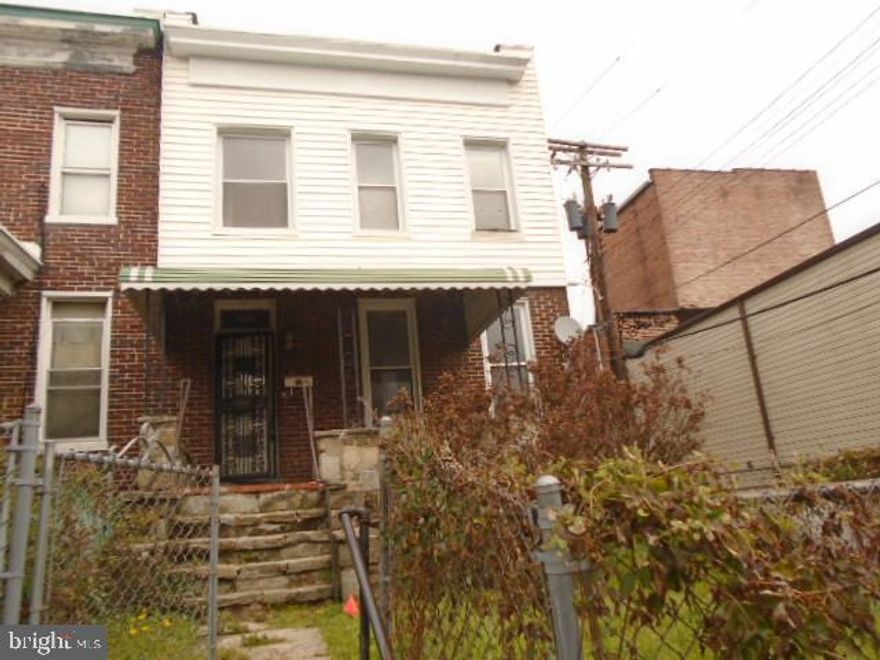 End unit row home features covered front porch with  fenced rear and front yards. Open floor plan on main level. Upper level has 3 bedrooms and full bath, Rear bedroom has private balcony. Lower level has full bath , partial kitchen and space for rooms . Close to schools and shopping . Easy access to downtown. Agents see agent remarks and all documents on this listing for complete contract instructions.