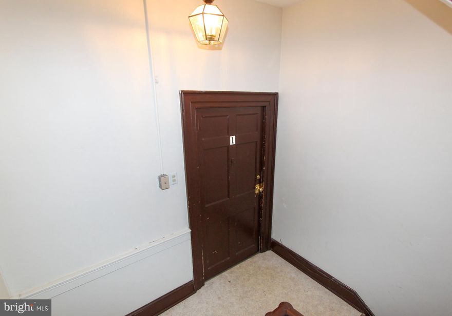 This oversized 3 bedroom, 1 bath downtown apartment is a second floor apartment-home conveniently located in the heart of Charles Town. Close to commuter routes and within walking distance from all of the downtown shopping and dining. Unit features living and dining rooms along with the kitchen and various creative storage spaces. Bedroom at the back of the apartment has its own little balcony and a separate exit with stairs to the back alley. Two front bedrooms overlook the main street. No laundry on sight. No off-street parking. Rent price includes HVAC filters, Renters Insurance, water, sewer and trash.

NO PETS.

EHO.