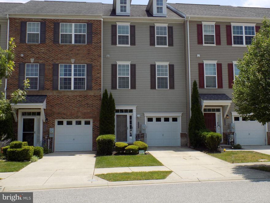 This one won't last long.  This  well maintained, Spacious 3 level townhome with attached garage has a bathroom on every level.   It boasts beautiful hardwood floors,  plush carpet, updated  kitchen with endless countertop  space, a primary suite with two closets and a dual vanity, lower level family room, privacy fence, and rear deck.  The open floor plan is perfect for entertaining and  there is an abundance of natural light on every level.  To See it is to Love it!