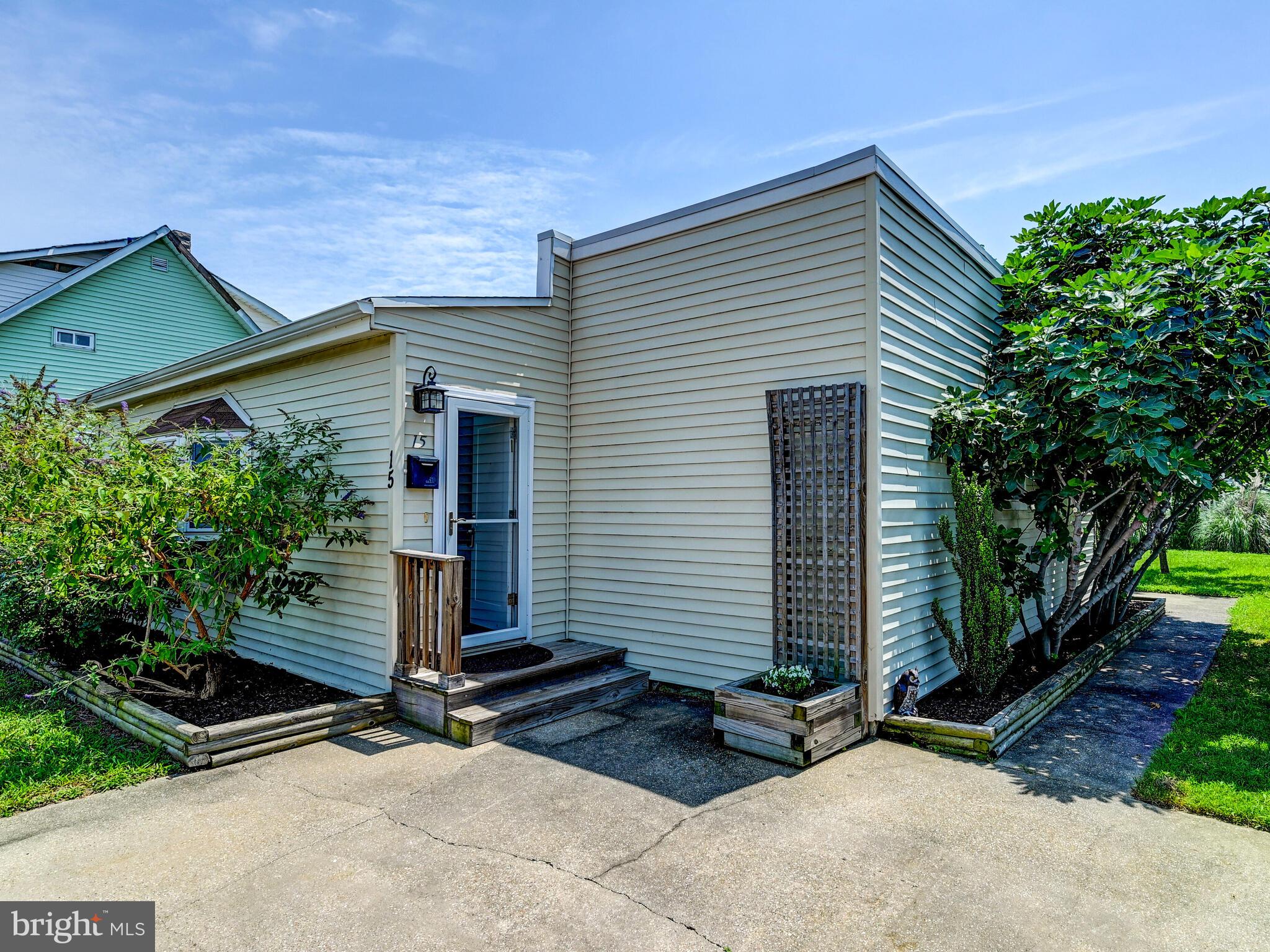 ** OPEN HOUSE, SATURDAY, AUGUST 2nd; 12-2PM. ** Updated, main-level living bungalow, tucked into a water-oriented community of historic Carnegie, just one block from the water and less than ten minutes to Seagirt Marine Terminal and the Port of Baltimore! Ideally located near waterfront parks, public boat ramp, and surrounded by plenty of shopping and restaurants, this home offers the perfect blend of convenience and lifestyle. Dundalk, MD, just outside the city limits with the benefits of Baltimore County living—lower property taxes and water bills included! Inside, you'll find a creative and flexible floor plan featuring two spacious bedrooms plus a versatile den- perfect as a guest bedroom, playroom, or home office. All windows (4) in bedrooms and den are less than two years old. The updated interior blends character with function, and the basement offers generous storage space for all your needs. Outside, this home is truly a hidden gem! The property is surrounded by mature landscaping and fruit trees, including multiple fig, pear, apple, and peach trees—a mini orchard in your own backyard. The rear yard is partially fenced, with a shed and framed with lush evergreens and natural grasses, creating a private, natural border that's perfect for relaxation or entertaining from the back porch and yard. Enjoy the water-oriented lifestyle with nearby access for boating, kayaking, and fishing nearby. Conveniently located close to major routes, local parks, and essential amenities, this home is a rare find in an unbeatable location. Don’t miss your chance to own this unique, convenient retreat in Baltimore County.