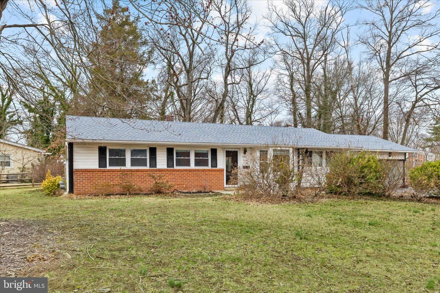 Welcome to this beautifully updated, charming, and truly move-in ready 3-bedroom, 2-bath rambler. Situated on a spacious corner lot, this home offers both comfort and convenience, with a 2-car carport and extended paved driveway providing ample parking.

The beautiful kitchen features sleek cabinetry, quartz countertops, and newer appliances, creating a stylish and functional space for everyday living and entertaining. Just off the kitchen, a custom-built 12x20 screened porch with dual ceiling fans offers the perfect setting to relax or entertain year-round.

Extensive upgrades were completed between 2021–2022, including a new roof, upgraded electrical panel, the addition of a gas hookup and a tankless (on-demand) water heater for modern efficiency.

Additional highlights include bamboo wood flooring, recessed lighting, custom blinds, and a renovated third bedroom with HVAC, currently used as a cozy den or flex space.

Conveniently located near major commuter routes, shopping, and dining, this home offers both accessibility and comfort. Don’t miss your opportunity to own this thoughtfully upgraded property. Schedule your private showing today!