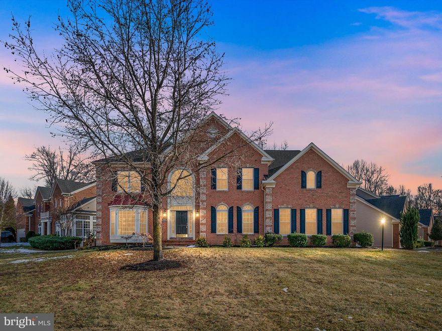 Sought-after gated golf course community of Oak Creek!  This meticulously maintained home offers a unique floor plan that includes a  grand foyer, and open floor plan with great use of space.  The home has extensions on all levels, a huge master suite, and a fully-finished basement ideal for an extended family or tenant. It includes a full kitchen, an in-law suite, and laundry room.  The man-cave area has a media room, a 200 gallon salt water aquarium, and additional living space! Finishes include - recess lighting, hard wood, granite surfaces, upgraded carpeting, stainless steel appliances, and neutral paint throughout! This well-appointed listing sits on a side lot that makes for a convenient outdoor living space, with no space for a pool. This home is ideal for entertaining with no expenses spared. Side load, two-car garage.  Back-up generator included.  New roof 2024.