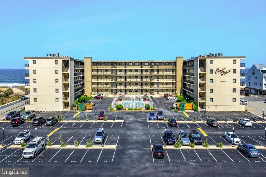 Bright and spacious designer furnished and designer painted with custom murals, large 2BR/2BA steps from the beach and priced to sell!  This condo is located in the desirable building Ocean Place close to the Delaware line.  Rarely is there a condo for sale in this building. The large balcony has plenty of room and breathtaking ocean views.  As you walk through the front door you will feel the warmth of this open layout. The updated kitchen has silestone countertops, plenty of cabinet space and is sure to delight the cook in your family. The kitchen opens to a large dining room and living area for entertaining family and friends. The master bedroom is spacious and has its own private bath. The other bedroom is large as well.  The unit is being sold fully furnished and is ready for your