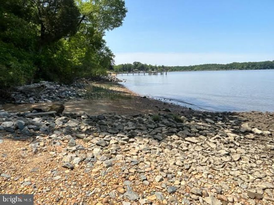 PRICE ADJUSTMENT!! Welcome to Morgan Creek Road! Where to start?
This home offers a little bit of everything for a lot of bit of everyone.
Horses? Check (community allows 2)
Deeded water rights to the Bohemia River?  Check!
Land?    Check
Garage?   Check!
Location?   Check!
As you drive along the decorative concrete driveway and particularly as you walk through the front door, we imagine a few words in particular will spring into your mind:   Impeccable.  Elegant.  Spacious.
This SUPER LARGE 4 bedroom, 2 Full Bath, 2 Half Bath single family home nestled on a private 5 acre lot with crown molding, Red Oak Select flooring, double sided fireplace, mudroom (with laundry), wainscotting, and 9ft ceilings is just SCREAMING for you to buy it! Did we mention the overly spacious finished basement with its own wet bar and walk out to backyard?!?! If you need storage-boy does this home have it-from your 2 car attached garage to your detached 2 car garage you're covered!
Behind this home is the 52-acre private property and out the front door you stare at a large open space lot-so don't worry about nosey neighbors with this one! Close to waterfront dining, wineries, Grove Point MHA and Bohemia River state park (that both have horse trails)-Don't delay, schedule your showing today!