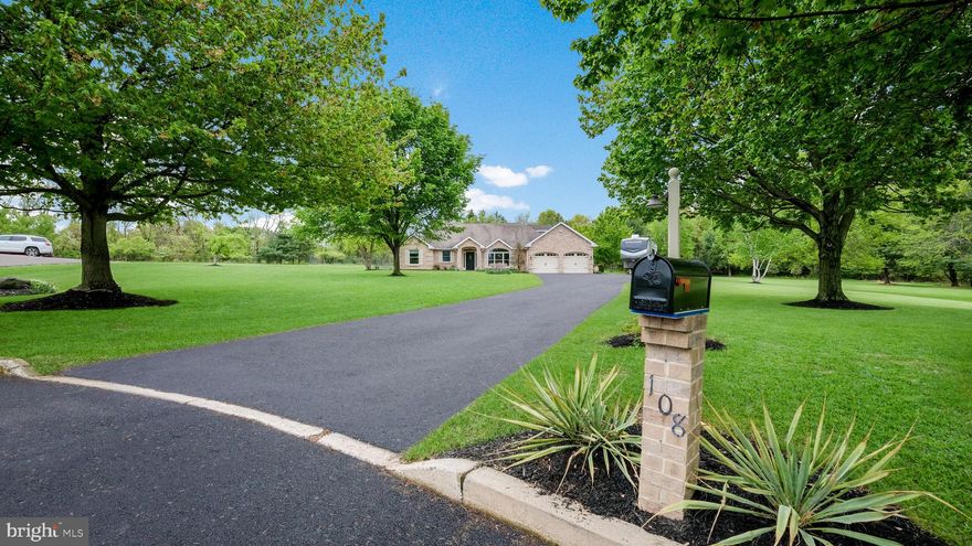 Tucked away on over 3 beautiful acres in Hilltown Township, this exceptional custom-built brick Cape offers a rare blend of privacy, character, and everyday comfort. Set back from the road in a quiet cul-de-sac setting, the home makes a lasting first impression with its stately curb appeal, expansive driveway, thoughtful architectural details, and peaceful natural surroundings.
A charming brick walkway leads to the covered arched entry, where you’ll also discover an inviting front deck — a lovely spot to enjoy your morning coffee while taking in the serene setting. Step inside to the foyer that opens to a spacious living room featuring vaulted ceilings, skylights, and a fireplace with a woodburning insert that brings warmth and timeless character to the space.
The living room flows beautifully into the large eat-in kitchen, complete with a generous island, quartz countertops, and plenty of room to gather. Just beyond, the four-season sunroom is a true highlight, offering recessed lighting, and wonderful views of the backyard throughout the seasons. A perfect spot to cozy up and read a book. A formal dining room overlooks the picturesque front yard, creating an ideal setting for holidays, dinners, and special occasions.
The main level offers two bedrooms and two full bathrooms, including a comfortable primary suite with a window seat and built-in storage overlooking the side yard. The primary suite also features an updated en-suite bathroom, a walk-in closet, and an additional closet. You’ll also find a nicely sized second bedroom and full hall bathroom. Upstairs, a versatile bonus room with a spacious walk-in closet offers endless possibilities as a third bedroom, home office, studio, or guest space.
Practical spaces have been thoughtfully designed as well, including a laundry room, mudroom, and powder room conveniently located off the oversized two-car garage. You'll also appreciate the convenient central vac system. The unfinished lower level, with Bilco doors to the exterior, provides excellent potential for a workshop, storage or hobby space.
Out back, a paver patio with a gazebo creates the perfect setting for al fresco dining, entertaining, or simply relaxing and enjoying the peaceful acreage. There is even a fenced area ready for a garden. With its private setting, flexible floor plan, beautiful indoor and outdoor spaces, and convenient access to shopping and dining, this Hilltown Township home is a truly special opportunity.