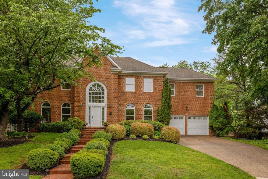 Welcome to this stunning brick front colonial nestled in a prime Vienna location! With over 5,000 square feet of beautifully finished living space, this 4-bedroom, 3.5-bath home offers timeless elegance and modern comfort. Freshly painted throughout, the main level features refinished hardwood floors in the living room, dining room, and office. The spacious, light-filled office is ideal for working from home, while the grand two-story foyer and new fixtures add a stylish touch. The gourmet kitchen boasts a large granite island with a gas range, a built-in desk area, and a perfect dining space that flows into a dramatic great room with vaulted ceilings, new carpet, and a cozy fireplace.  The formal dining room is conveniently located off of the kitchen and is the perfect room for dinner parties with friends and family.  Enjoy seamless indoor-outdoor living with access to the refinished deck from both the kitchen and great room.

Upstairs, you'll find new carpet in all bedrooms, including a luxurious primary suite with a massive walk-in closet and a fully remodeled spa-style bath featuring a double vanity, soaking tub, and a glass walk-in shower with custom tile. The finished lower level provides a spacious recreation area with a pool table, movie/lounge space, a bonus guest room, and a full bath. With a convenient upper-level laundry area and multiple living spaces, this home is perfect for both everyday living and entertaining.   Fantastic location -- just blocks from from Meadow Lane Park for children to play along with tennis courts and basketball courts.   Super convenient to all of Vienna's charming shops and restaurants and the Vienna Metro!  This home offers the perfect combination of space, style, and location!
