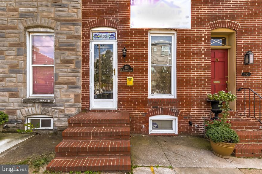 PARKING PAD.  NEW KITCHEN.  This well maintained and updated Federal Hill rowhome has it all!   The main level features gleaming hardwood floors, exposed brick, separate living room and dining room and an all new kitchen with white cabinets, granite countertops, & stainless steel appliances.   Easy parking pad out back.  Upstairs features 2 large bedrooms. The owners suite in the rear includes double bowl vanity, tub & shower, plus laundry.   The basement is bone dry with plenty of room for storage.  A+ location!