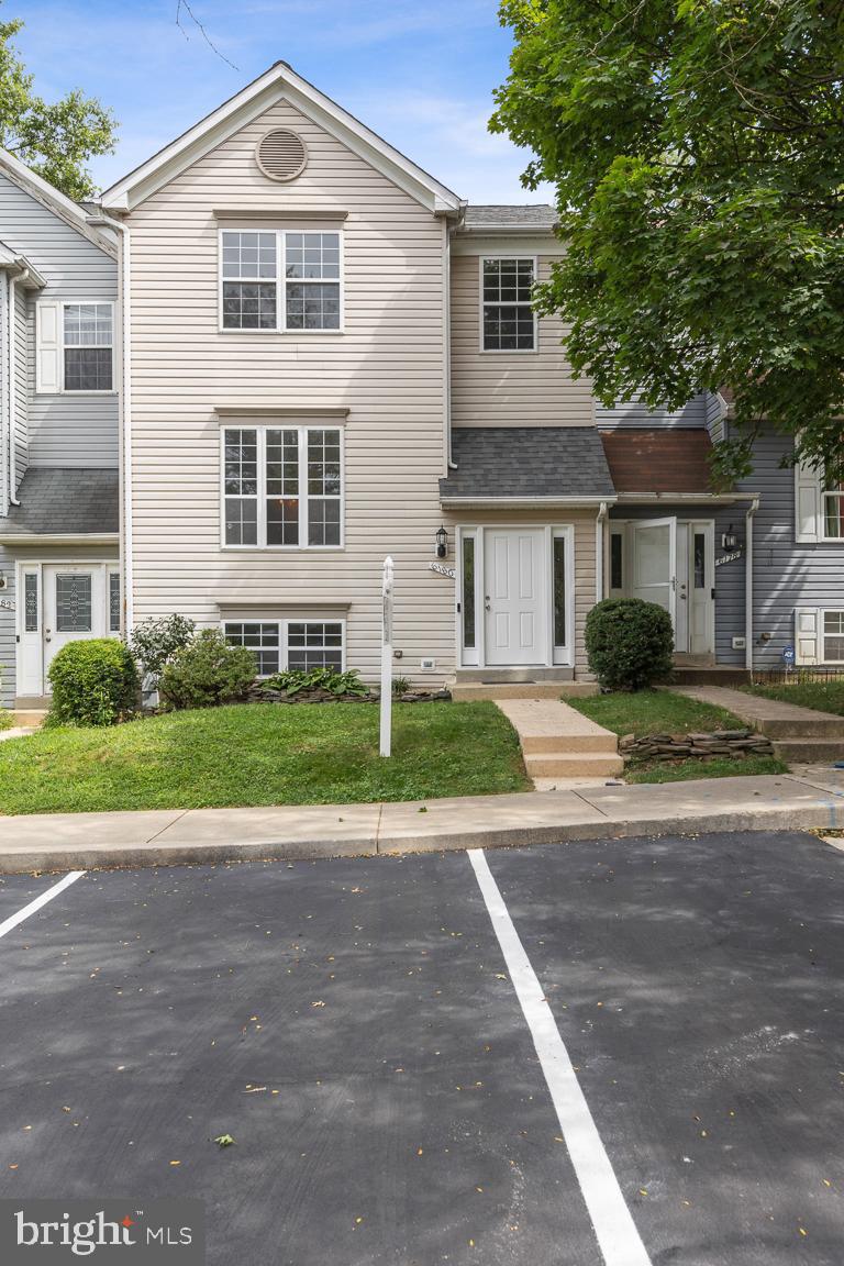 BEAUTIFUL & DESIRABLE TOWN-HOME IN THE HEART OF COLUMBIA! *** You'll love this FRESHLY PAINTED 4 bedroom, 3.5 bathroom town-home (with a two-story extension) backs to wooded open space. The main level features hardwood flooring with a large living room. The recently updated eat-in kitchen has granite countertops, breakfast bar, and stainless steel appliances (brand new dishwasher and stove which has a built in air-fryer). Enjoy entertaining and/or relaxing on the rear deck. The upper level has 3 bedrooms and 2 full bathrooms. The primary bedroom has a walk-in closet and it's own separate bathroom (with a large tub and standup shower). The lower level features a large recreation room with a fire place to cozy up on in the colder months. The 4th generously sized bedroom and a full bathroom is also located on this level with a walk-out to the rear yard . HVAC /Furnace replaced in 2017, roof in 2016, recently installed Radon Mitigation (2023). You don't want to miss this beauty!!! PLEASE REMOVE SHOES OR USE PROVIDED SHOE COVERS.
