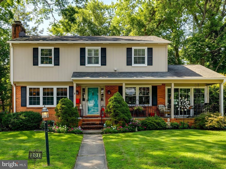 Perfectly positioned on a desirable corner lot within a Blue Ribbon school district, this distinctive five-level Colonial offers timeless architecture, thoughtful upgrades, and exceptional living spaces designed for both everyday comfort and gracious entertaining. At the heart of the home is the upgraded chef’s kitchen, showcasing abundant light oak cabinetry with integrated wine storage, glass-front display cabinets, and a convenient appliance garage. Granite countertops and a striking copper farmhouse sink anchor the space, while premium stainless steel appliances elevate functionality, including a commercial-grade dual-fuel range with gas burners and griddle, commercial range hood, warming drawer, Advantium microwave oven, dishwasher, and a French-door refrigerator with in-door ice and water. The kitchen flows seamlessly into the dining room, enhanced by classic wainscoting and a custom built-in storage bench—perfect for casual meals or hosting guests. The formal living room exudes warmth and elegance with hardwood floors, crown molding, and a wood-burning fireplace with mantle. Completing this level is a light-filled sunroom with mini-split system, offering year-round enjoyment and direct access to the deck and rear yard—an inviting extension of the home’s living space. The upper level is highlighted by a spacious primary bedroom suite with an updated bath featuring a double-bowl vanity with granite countertops, tile flooring, and a generously sized shower appointed with classic subway tile, integrated product niches, glass shower doors, and upgraded plumbing and lighting fixtures. Three additional well-proportioned bedrooms and a beautifully updated hall bath complete this level. The lower-level great room offers exceptional versatility, featuring brand-new luxury vinyl plank flooring, custom built-in display shelving, a convenient half bath, and direct access to the rear patio, yard, and driveway—ideal for entertaining, recreation, or extended living needs. An additional lower level includes a utility sink and is currently utilized for a workshop , providing valuable flex space with future potential. Notable updates and inclusions include a covered front porch, hardwood flooring throughout most of the home, a new 40 year architectural shingle roof on both the home and shed, new gutters, a newer HVAC system and water heater, updated windows, recessed lighting, a new tile fireplace hearth, and numerous additional improvements throughout. 
This extraordinary home offers the perfect blend of sophistication, comfort, and convenience—delivering an unparalleled lifestyle moments from 83, 695, and downtown Baltimore.