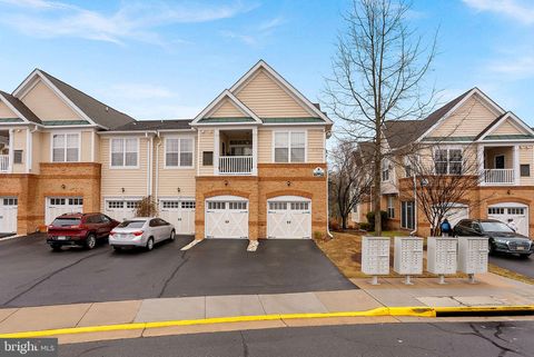 Photo of 43890 Hickory Corner Terrace #111, ASHBURN, VA 20147 (MLS # VALO2116376)