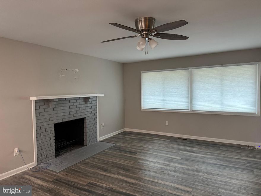 Very nice and clean home ready for the New Year. So many updates have been made so don't let the age fool you. Appliances are newer. Painting has been done. Large kitchen with plenty of cabinets and counters as well as a pantry for more storage. Bar area for your family and guests to sit and enjoy the kitchen while you entertain. Living area with fireplace leads to a screened porch area and spacious deck overlooking the trees and woods. Just lovely, peaceful setting for coffee or hot cocoa! 3 bedrooms upper level and 4th in lower level. Huge family room with another fireplace on the lower level. Separate Laundry room. Utility room for storage. Walk out basement to rear yard.